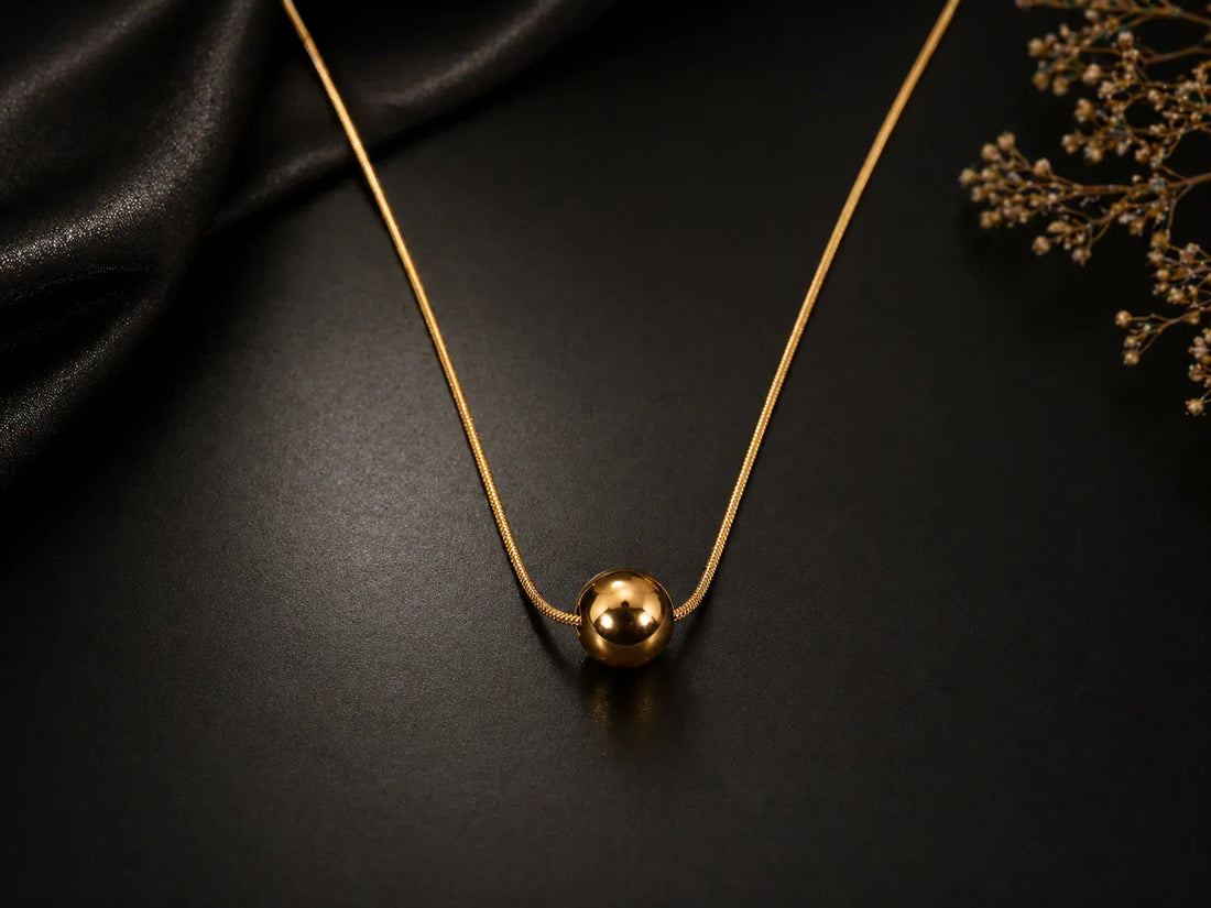Gold-plated necklace with ball pendant