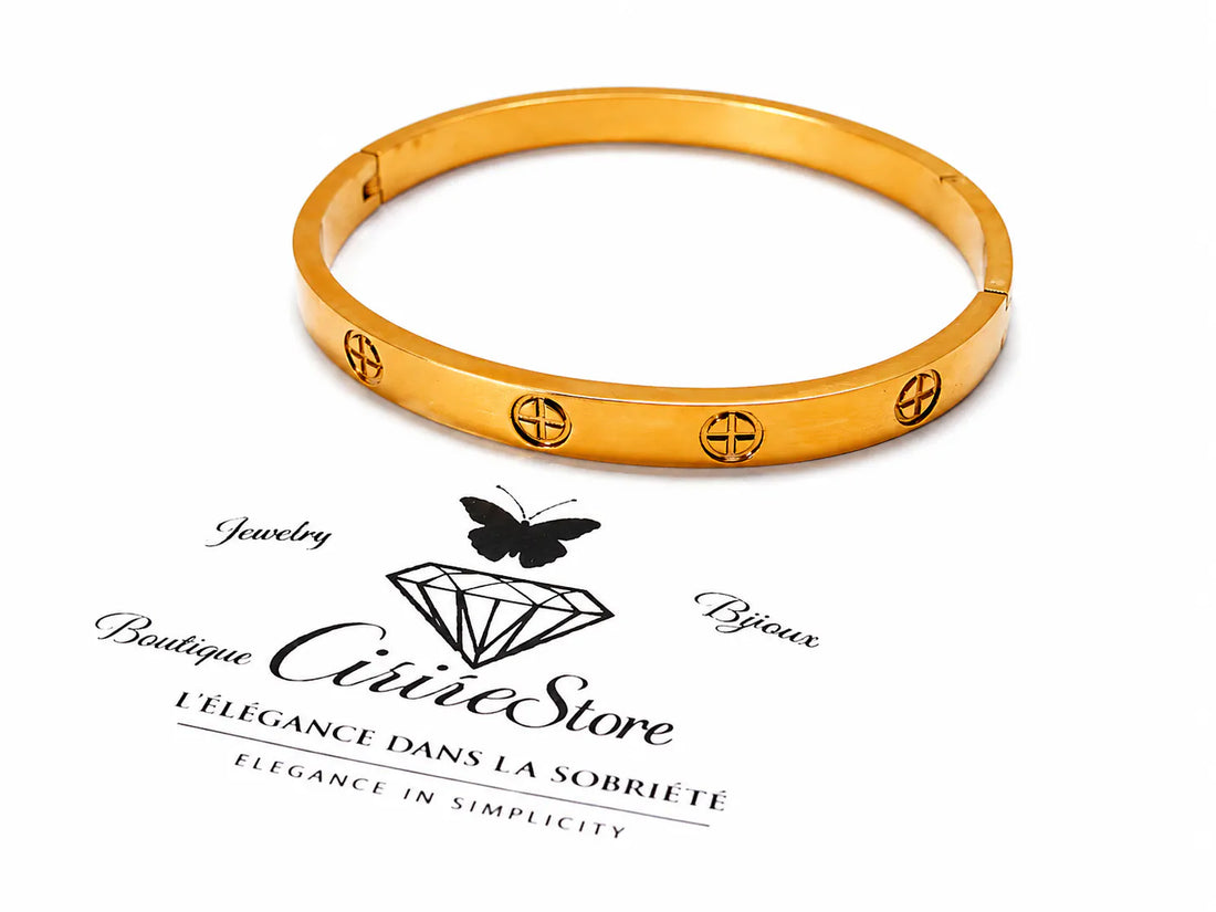Bracelet jonc doré avec motifs gravés
